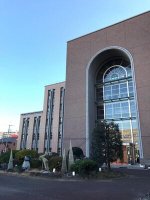 明和学園短期大学 ロゴ.jpg